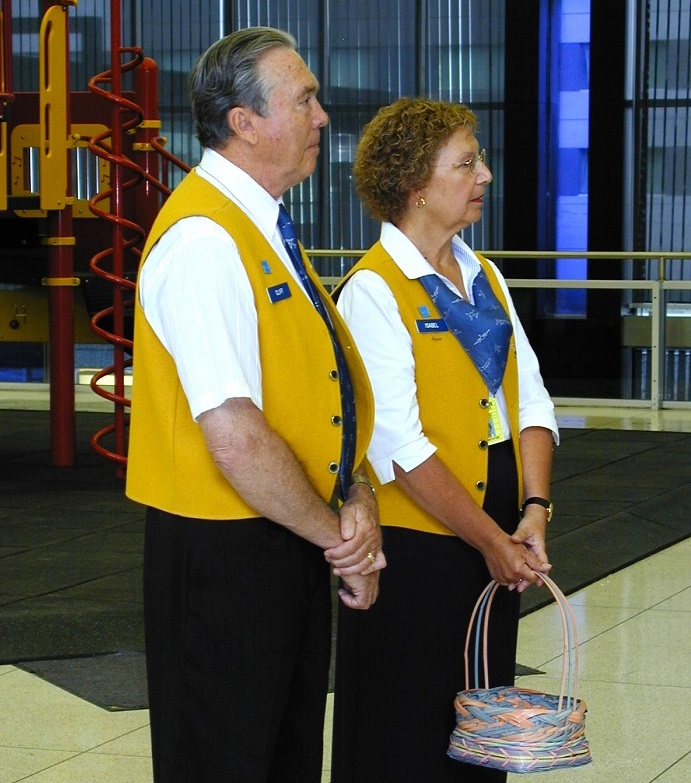 Two Goldwing Ambassadors standing in the terminal