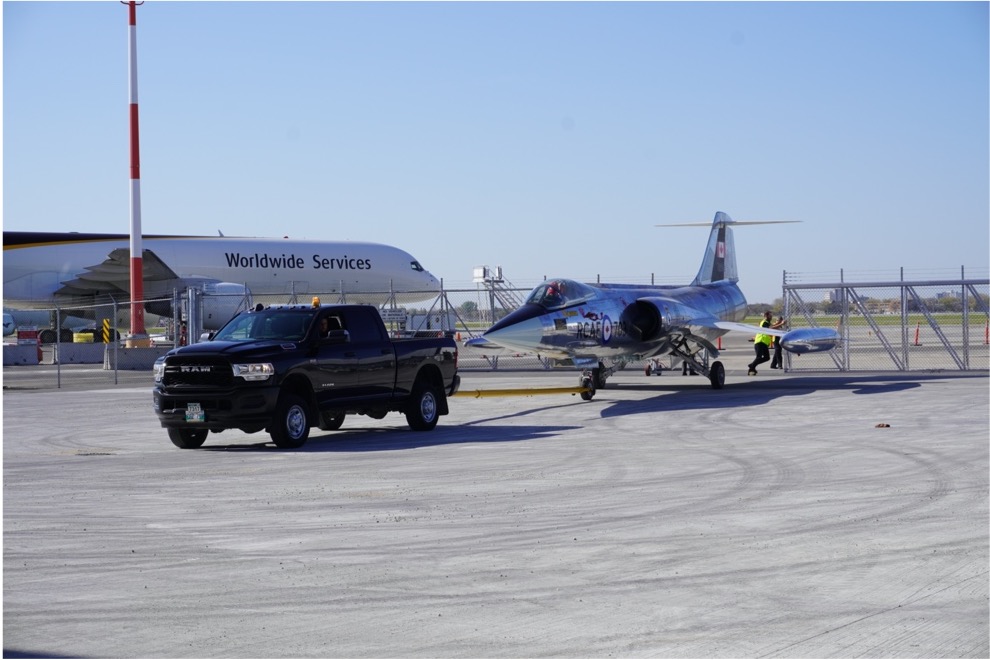 Photo taken by the Royal Aviation Museum of Western Canada of an aircraft being towed into its new home.