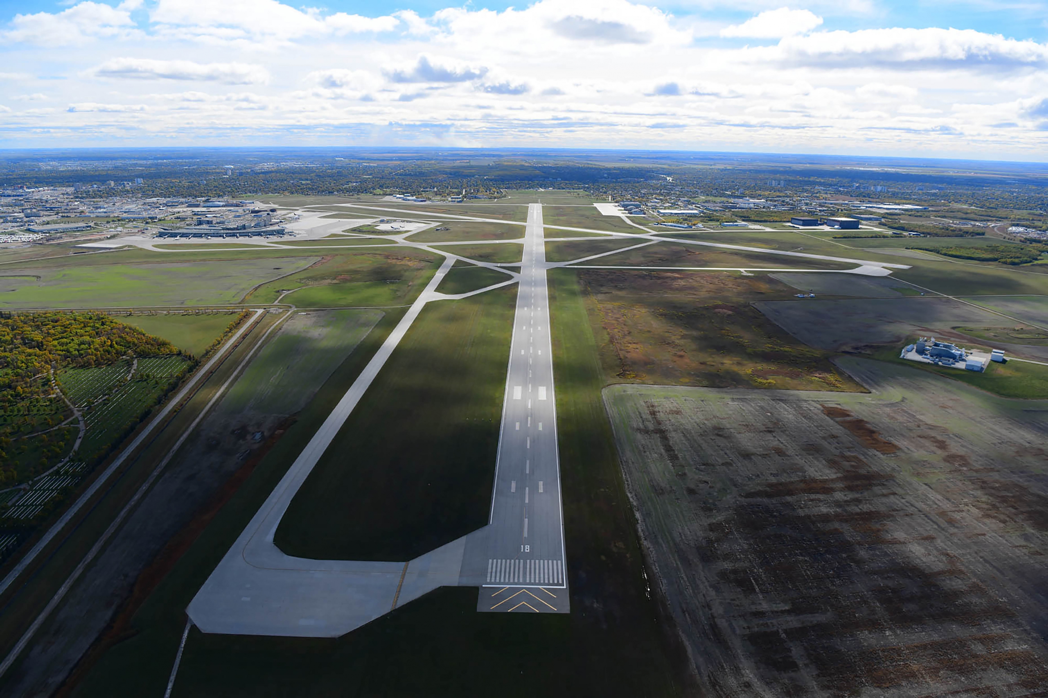 Aerial view of YWG looking down runway 18/36