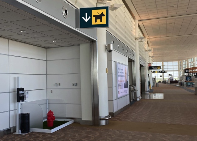 Animal Relief Area directly across from Gate 9