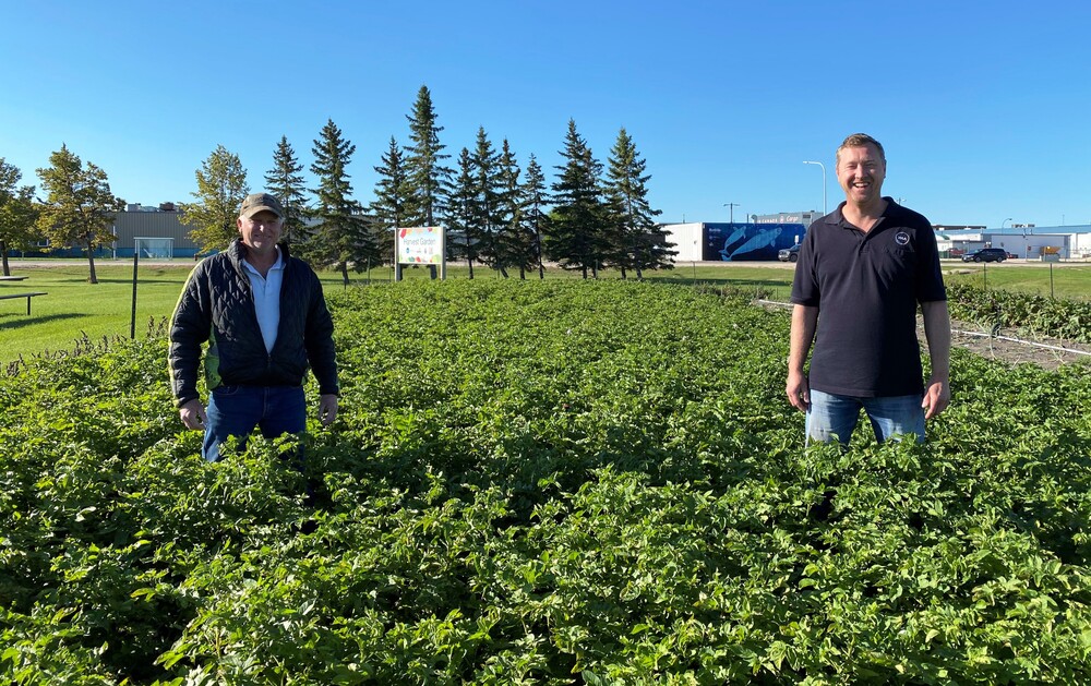 Members of the airport's groundside maintenance team pose in the Harvest Garden.